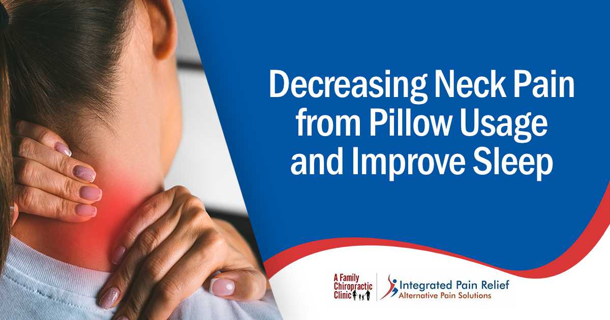 Image of a young woman massaging her neck to relieve pain after working on a computer, featuring A Family Chiropractic Clinic and highlighting how proper pillow usage can decrease neck pain and improve sleep.